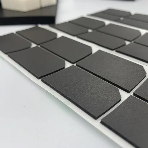 PU foam adhesive cushioning pads for battery energy storage assemblies