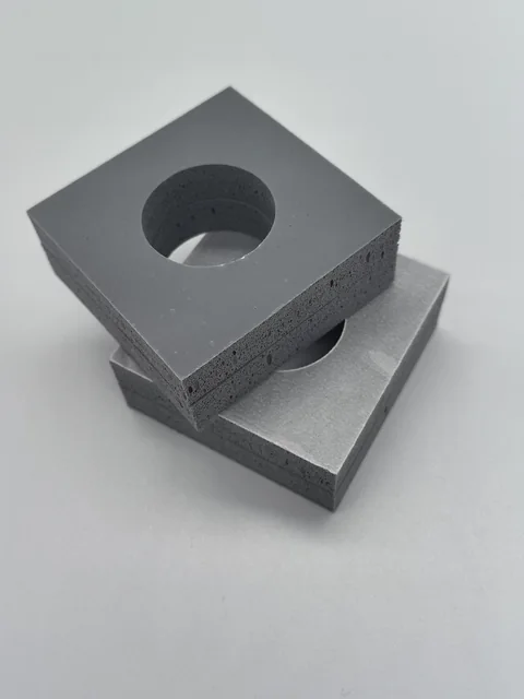 Layered silicone foam cushioning blocks